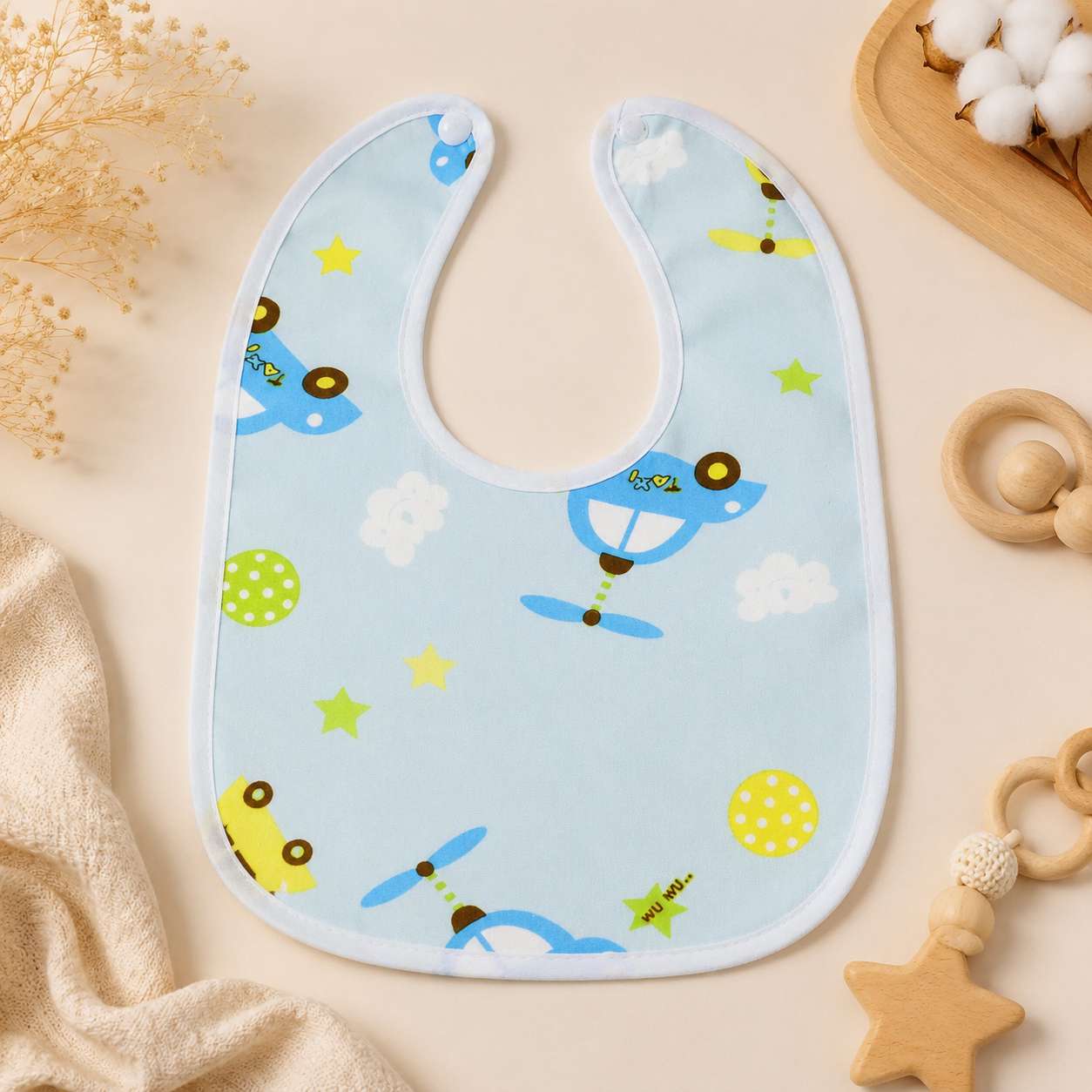 Baby Button Bib – 6–12 Months